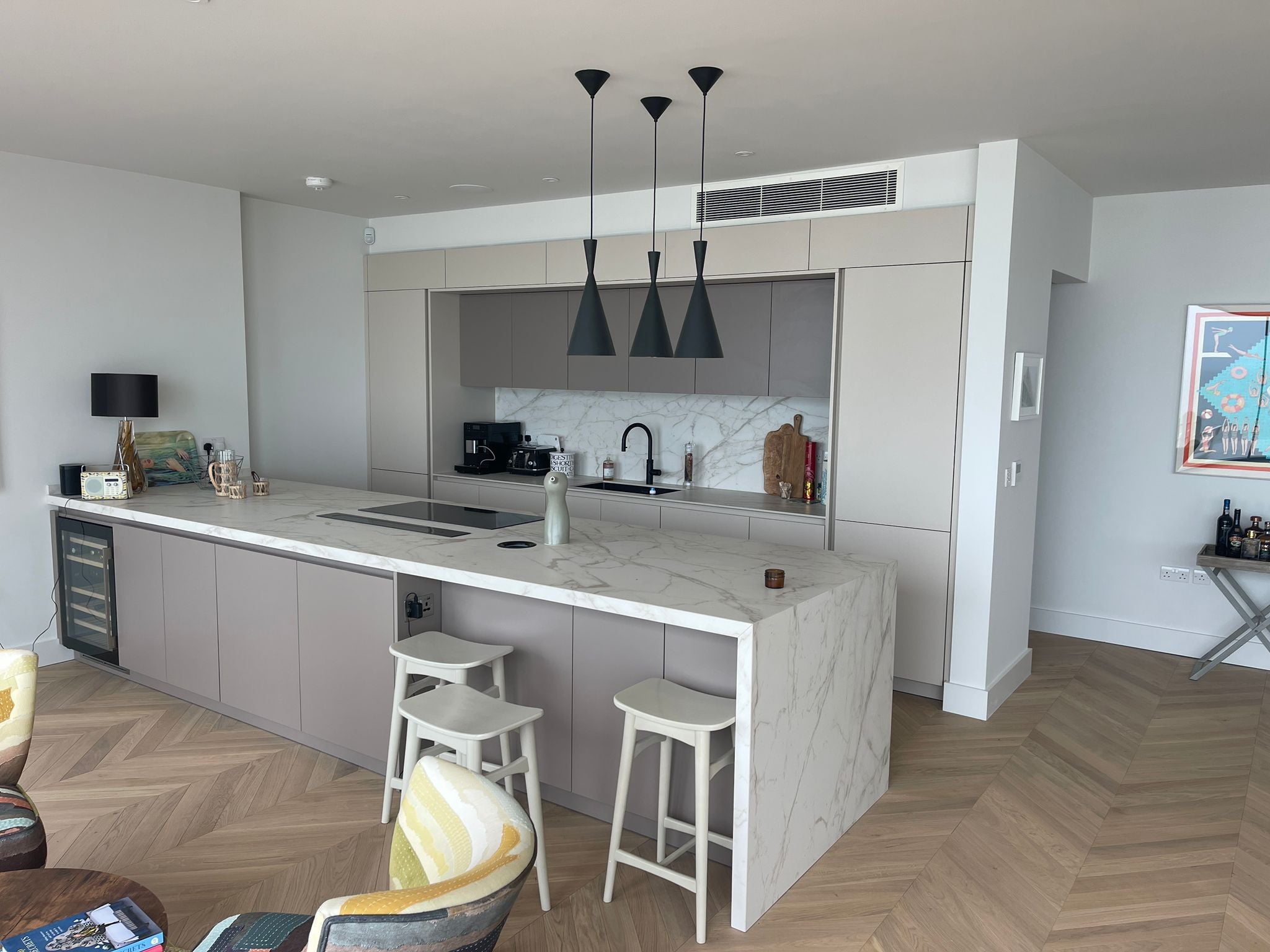 Concealed ducted air conditioning in a high-end open-plan kitchen and living room